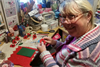 Lynda making Poppies for the British Legion and RAF