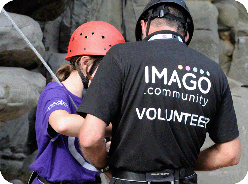 Photograph of an Imago Volunteer supporting a young carer